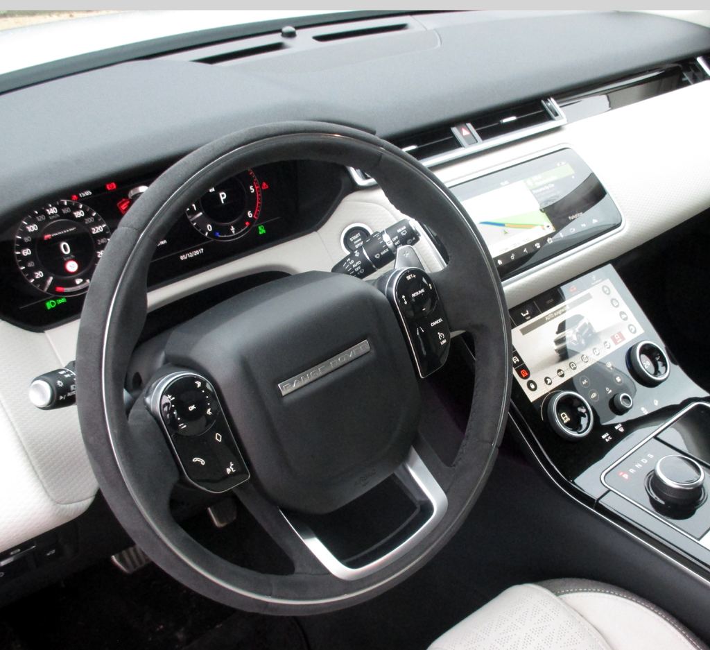 Land Rover Range Rover Velar: Gleich drei große Displays prägen das futuristische Cockit.